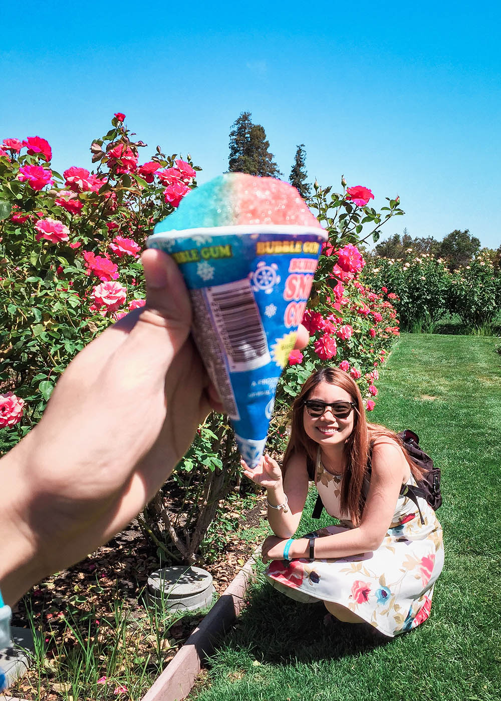 me holding ice cream in a garden