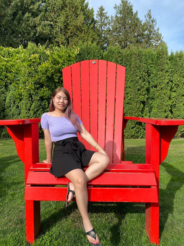 Have fun at giant red chair in the VanDusen Botanical Garden