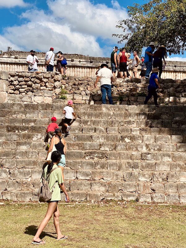 walking up the steps to the Governor's Palace in Uxmal Ruins