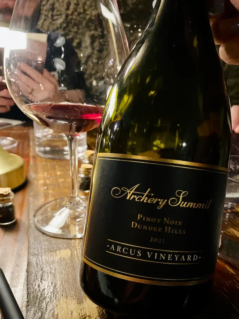 Close-up of an Archery Summit Pinot Noir bottle during a Portland wine tasting