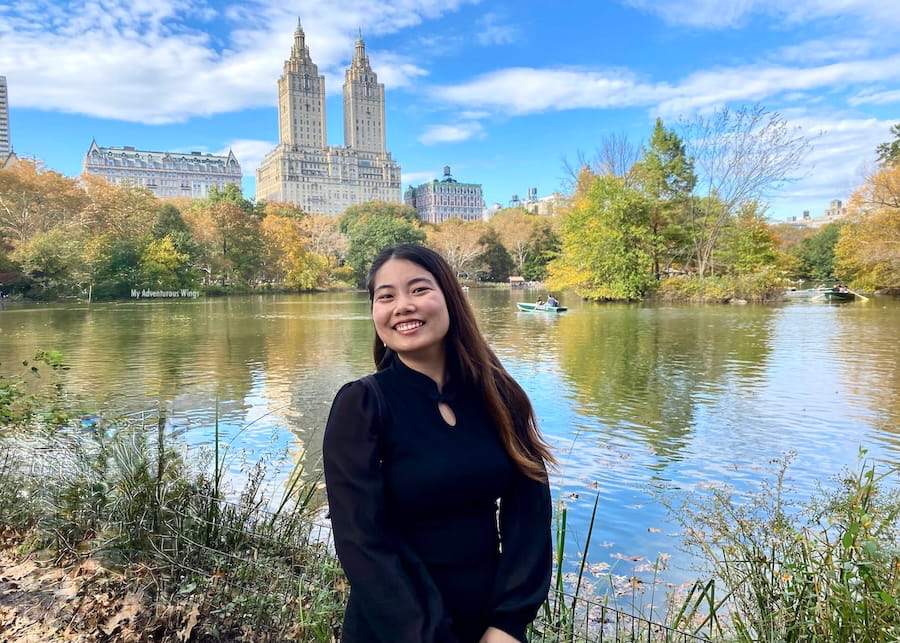 girl in front of the lake in Central Park, NYC on a budget activity
